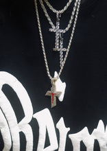 Load image into Gallery viewer, A well crafted Cross Pendant hanging round the neck of a person
